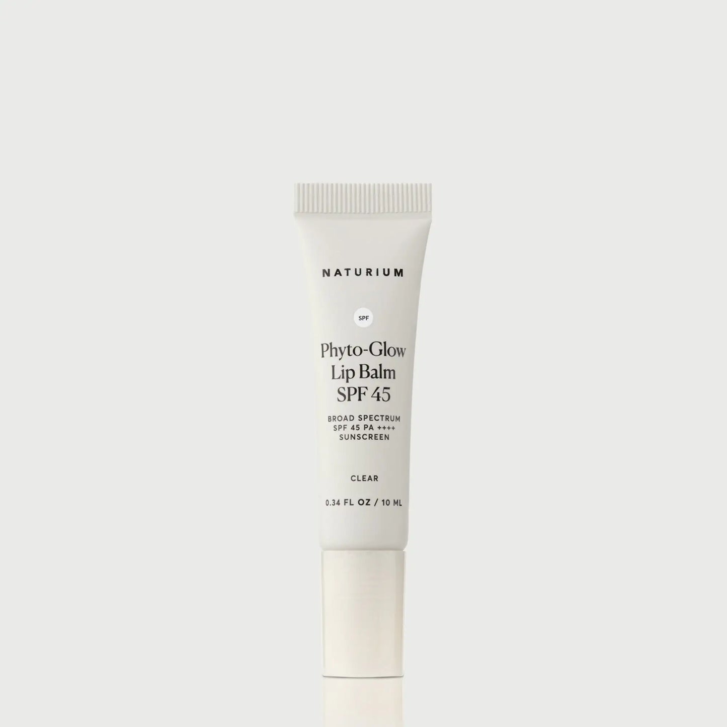 phyto-glow-lip-balm-spf-45-clear-i8 NATR-10124_PhytoGlow_SPF_Clear_primary_capon_front_bonebkgd_1.webp