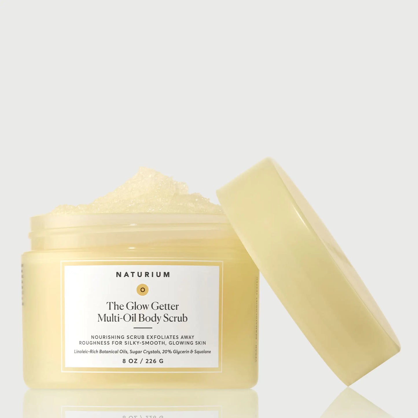 the-glow-getter-multi-oil-body-scrub-t4 NATR-40028-GlowGetter-Multi-Oil-Body-Scrub-Front-CapOff-bonebkgd.webp