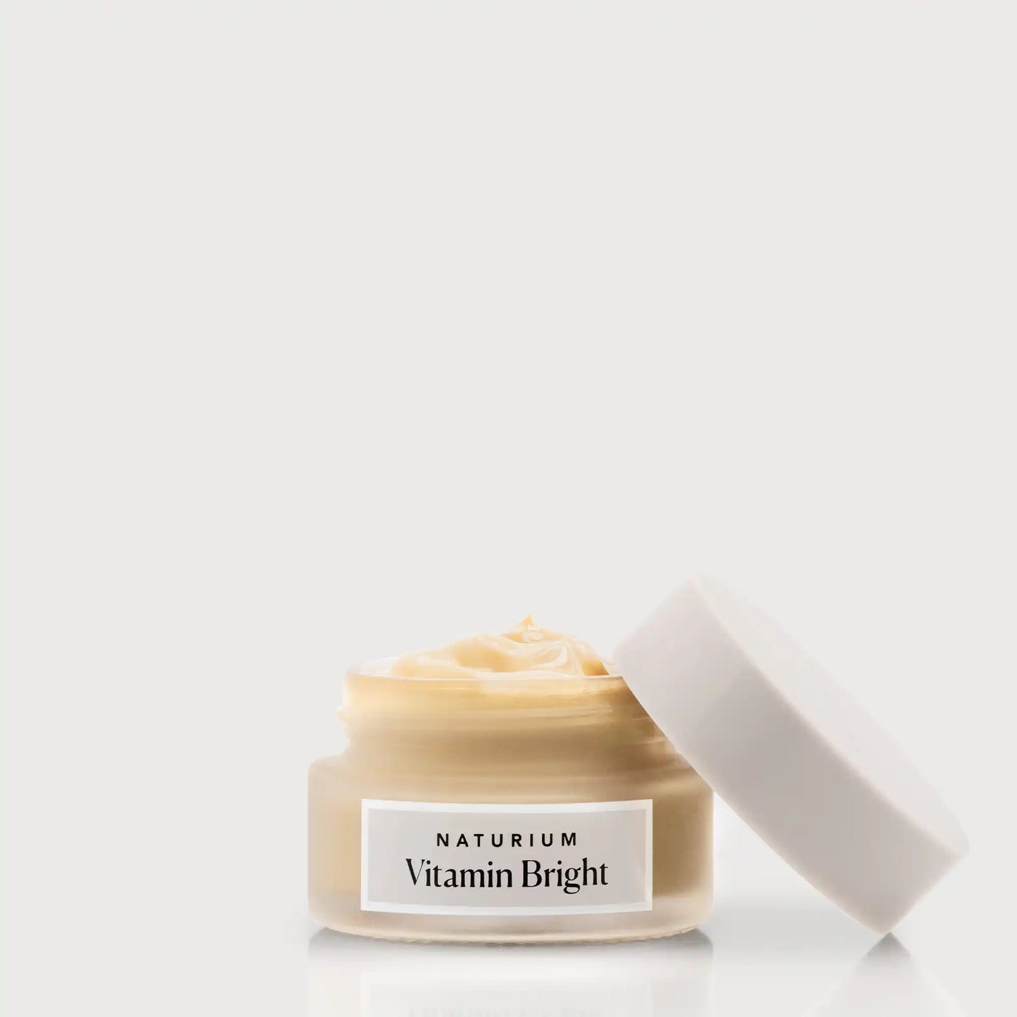 vitamin-bright-illuminating-eye-cream-a2 NATR-VitaminBright_LIGHT_Primary_front_openjar_bone.webp